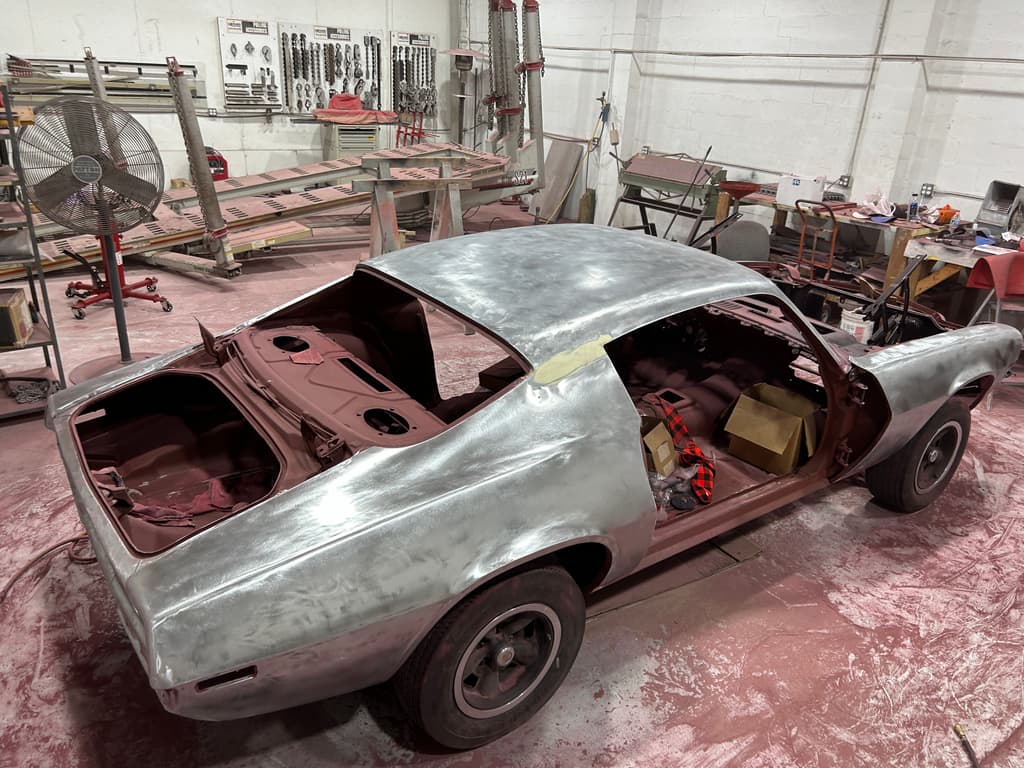 1970 Camaro body shell sandblasted to bare metal in the shop, interior and trunk in red oxide primer